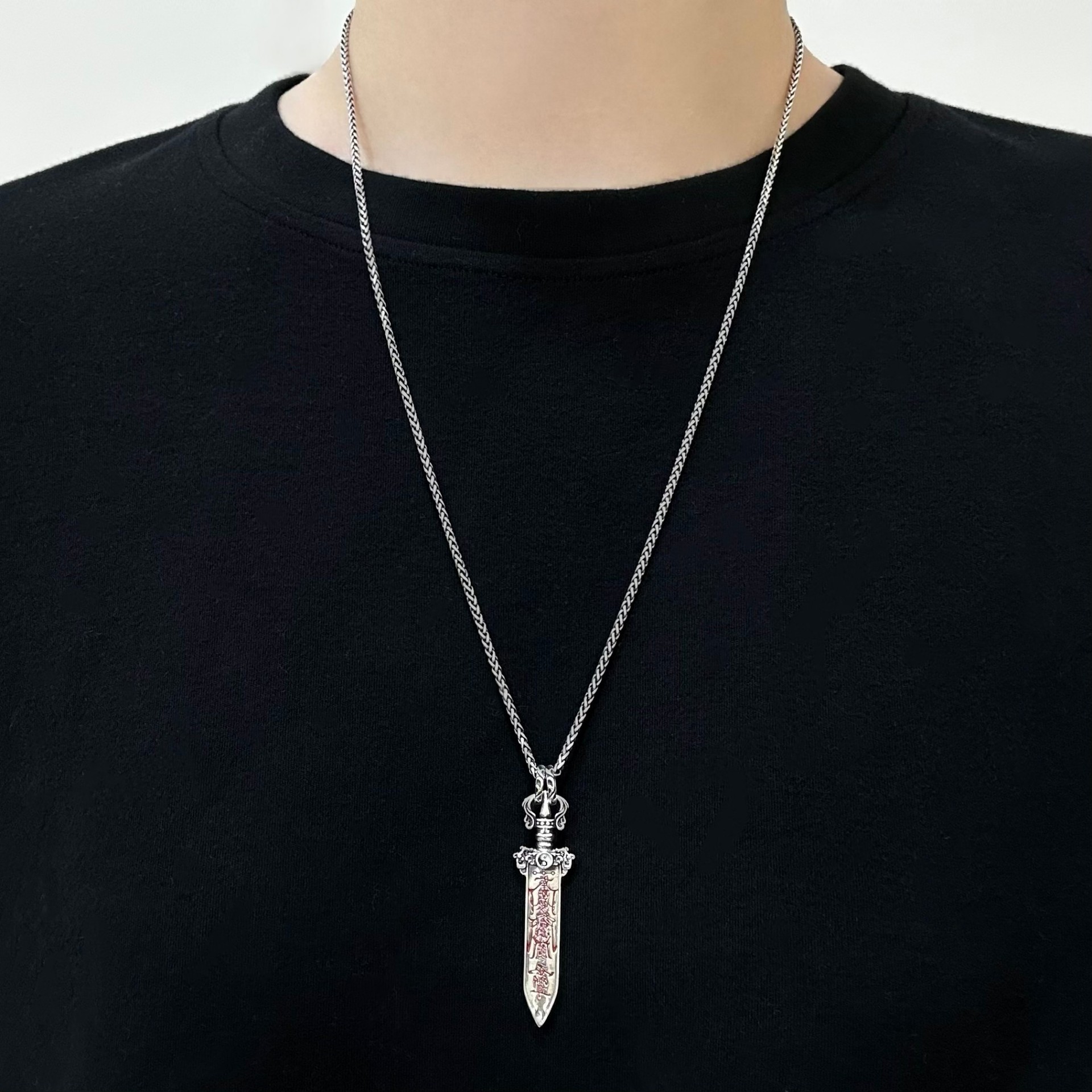 Model wearing S925 silver new Chinese style Bagua Ziwei sword pendant necklace daily outfit